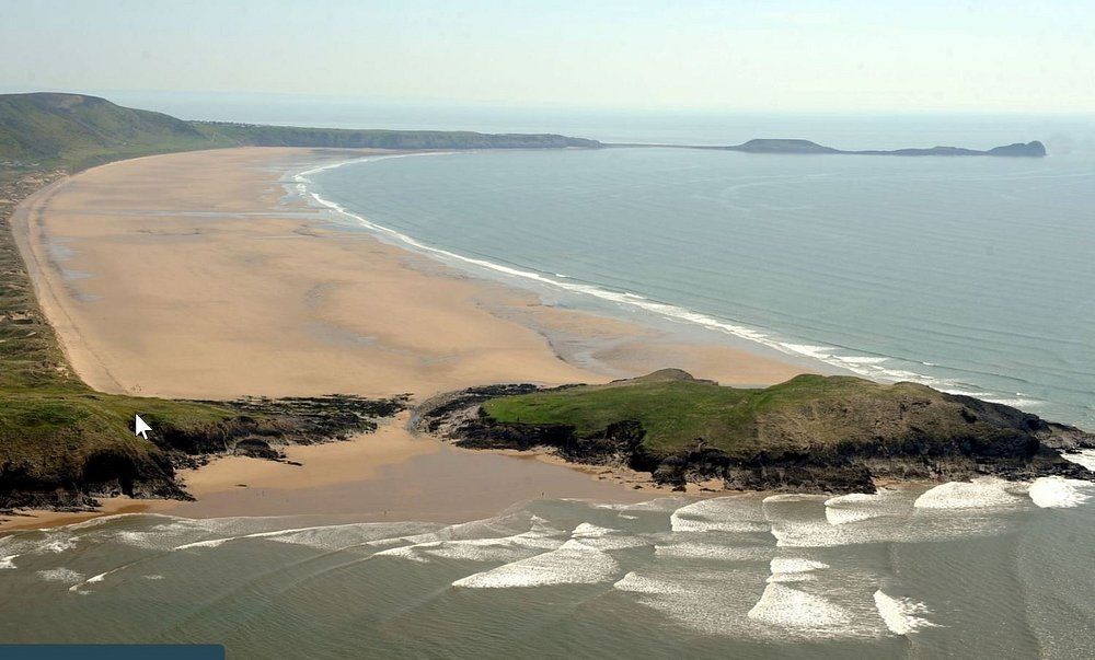 Stunning coastal views of Gower Peninsula beach