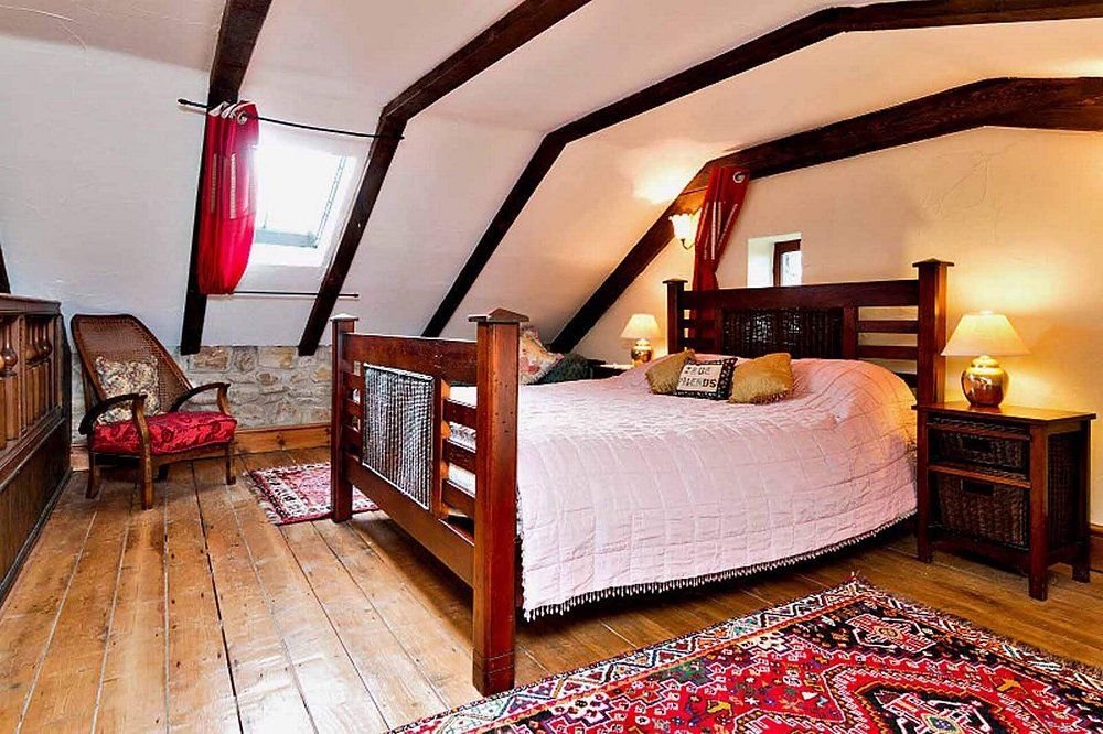 Charming bedroom with exposed beams