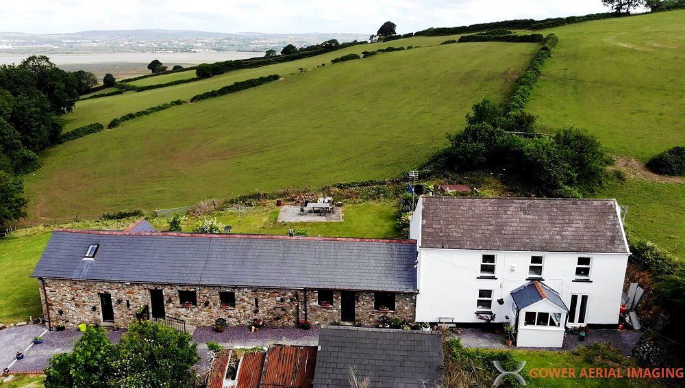 Aerial view of Blaen Cedi cottages in 3 acres of private grounds